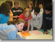 Meredith, Hannah, Whitney, Ms. Tammy(Whitney's mom), Alyssa, Micaelah, Ben, and Lucas all signing up for jobs.